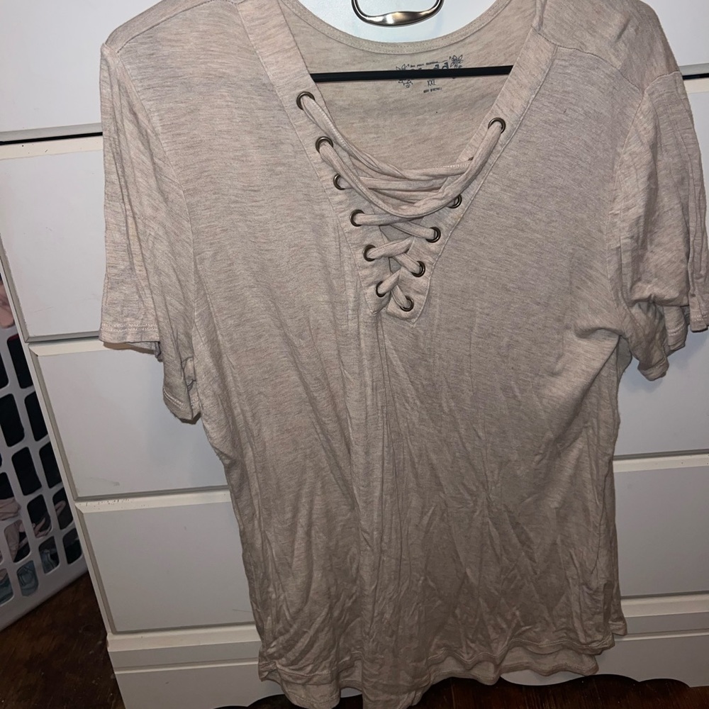 Tan shirt with crisscross front